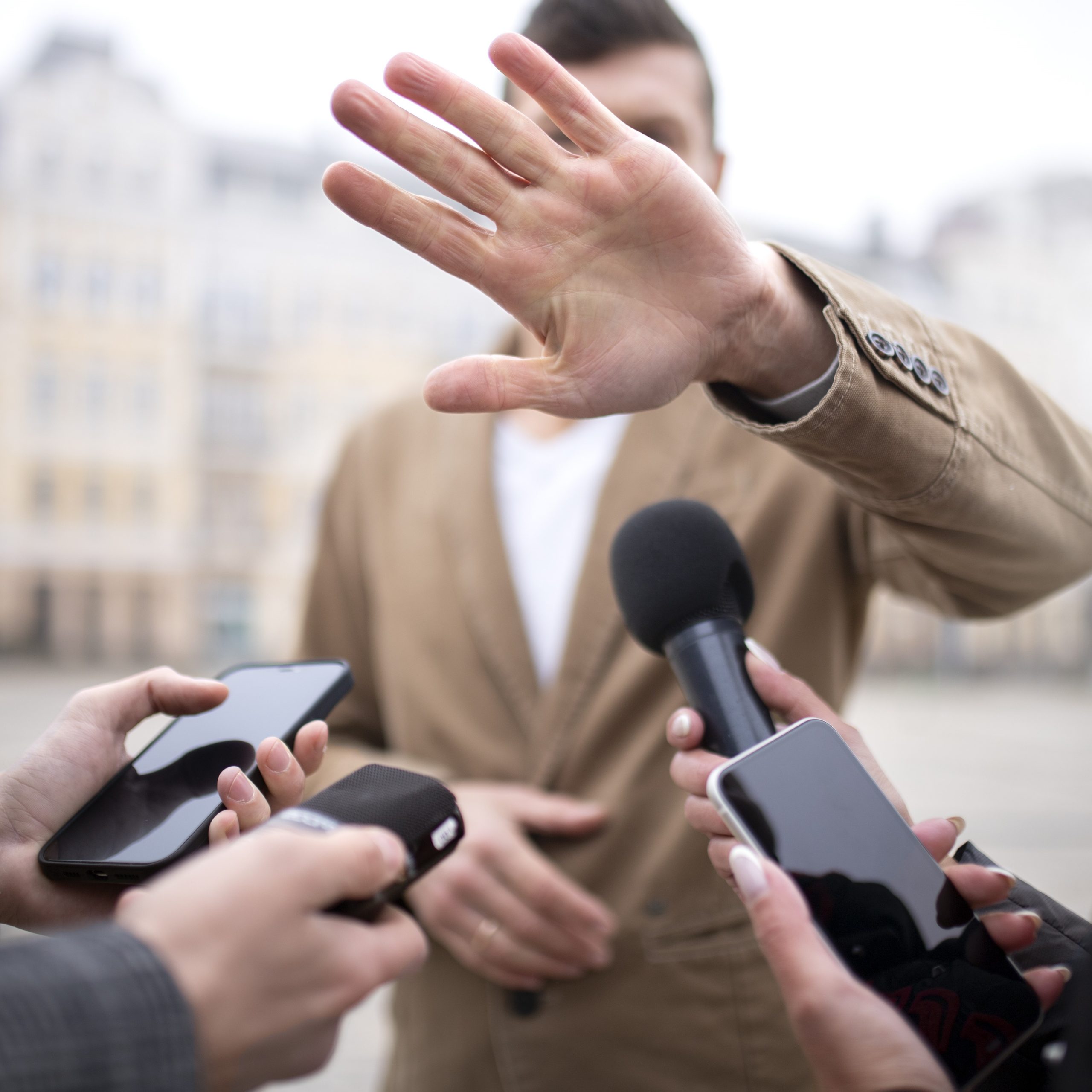 close-up-reporter-taking-interview